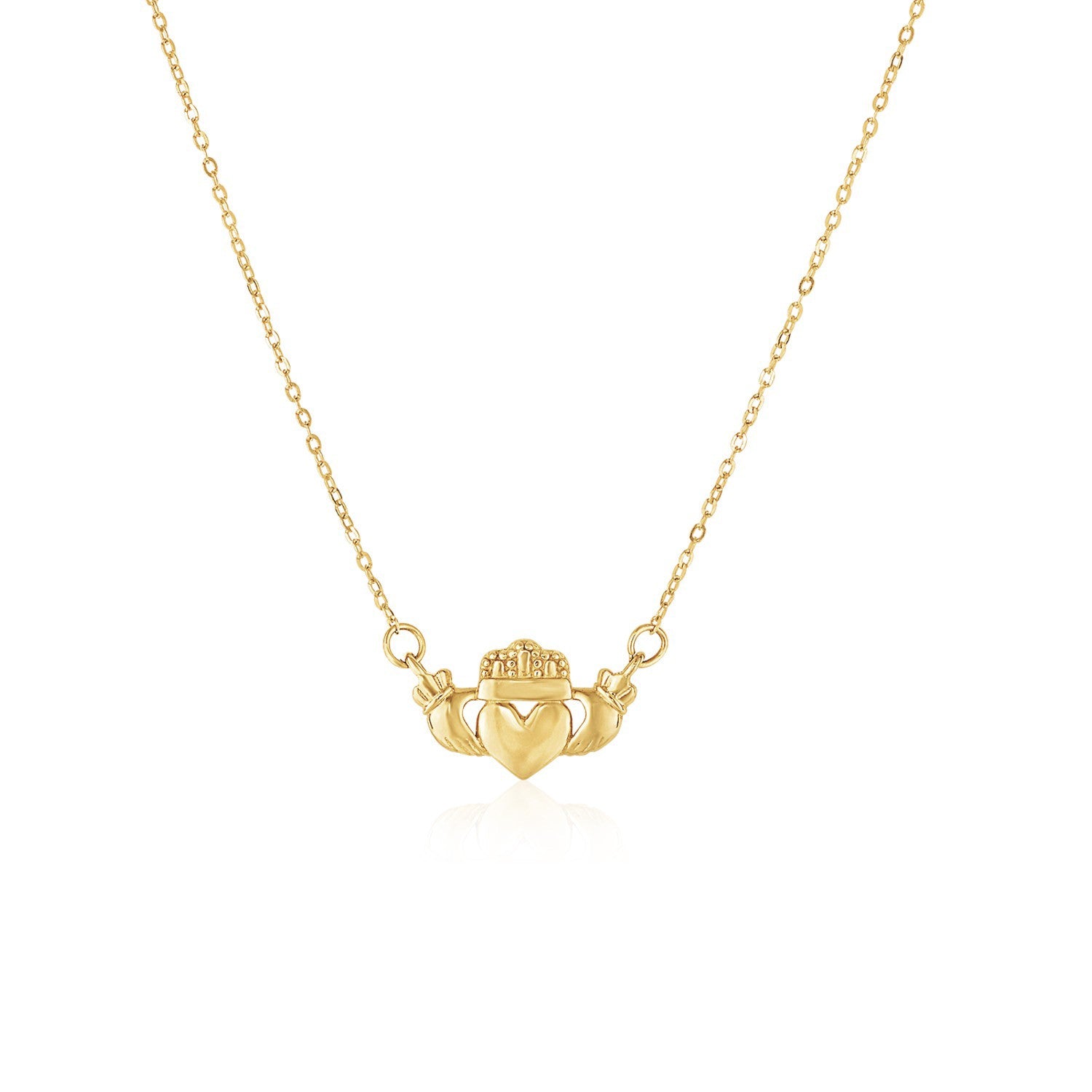 14k Yellow Gold Pendant with Claddagh Symbol in a sleek high-contrast midnight luxury editorial style